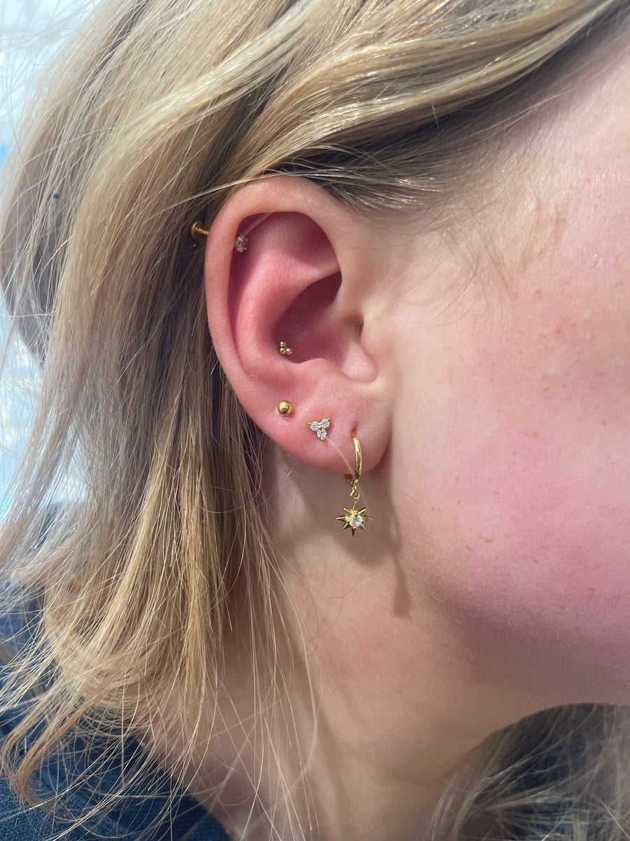 Tiny green flower stud earring